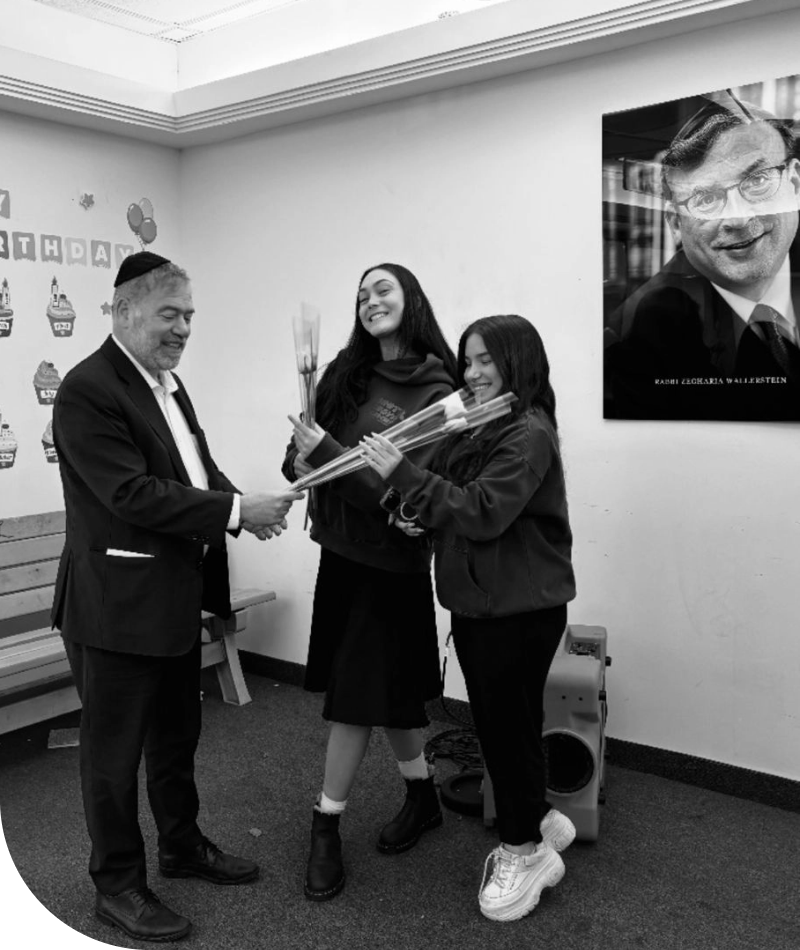 Rabbi Wallerstein would bring every single girl a fresh rose before Shabbos